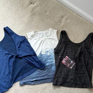 Lot of three Born Primitive crop tanks M and S